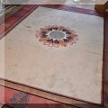 DR05. Asian style area rug with central Shou medallion. Measures approx. 11'10" x 8'2" 